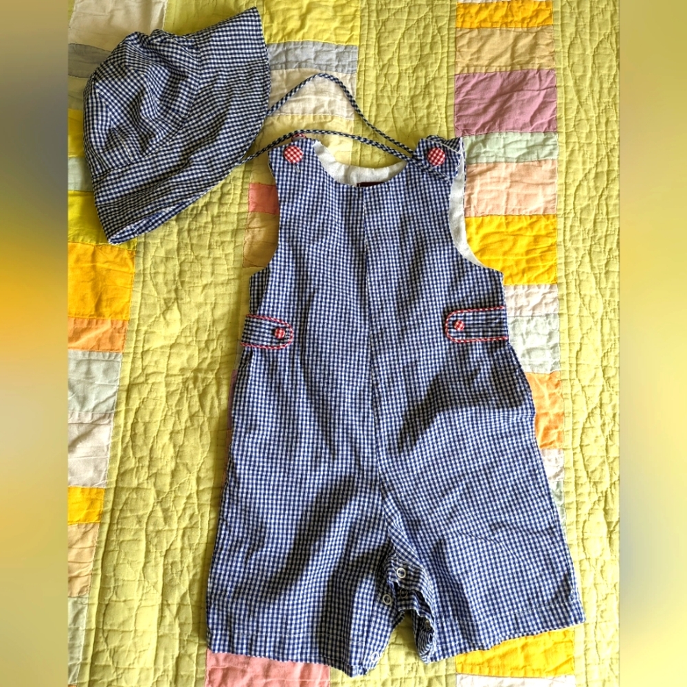 Blue gingham one piece outfit with matching sun hat.